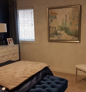 framed art print in a bedroom